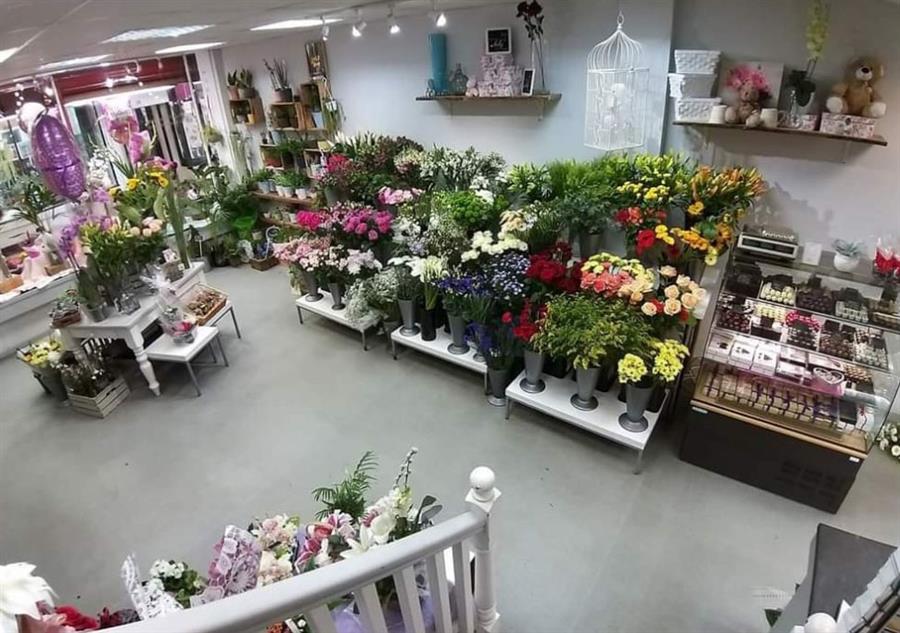 About The Tomlinson Flower Company